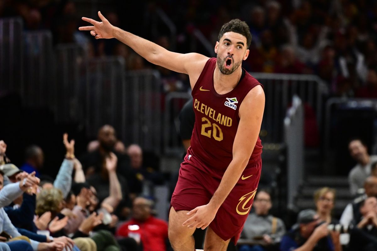 Nov 20, 2024; Cleveland, Ohio, USA; Cleveland Cavaliers forward Georges Niang (20) celebrates after hitting a three point basket during the second half against the New Orleans Pelicans at Rocket Mortgage FieldHouse. Mandatory Credit: Ken Blaze-Imagn Images