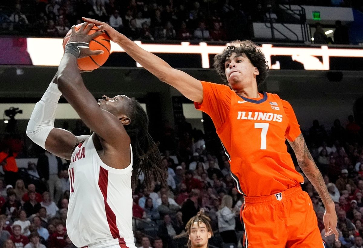 Nov 20, 2024; Birmingham, AL, USA; Illinois forward Will Riley (7) attempts to block a shot by Alabama center Clifford Omoruyi (11) in the CM Newton Classic at Legacy Arena. Mandatory Credit: Gary Cosby Jr.-Tuscaloosa News