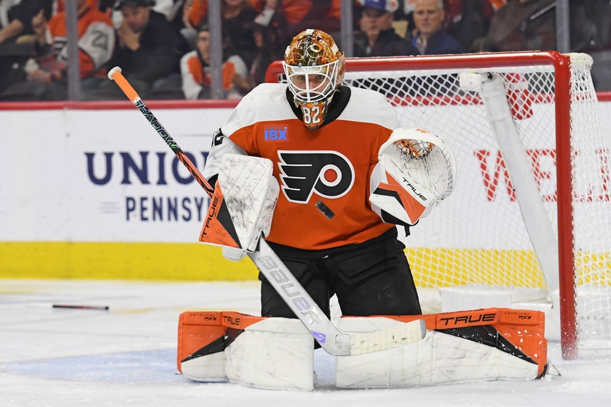 Nov 20, 2024; Philadelphia, Pennsylvania, USA; Philadelphia Flyers goaltender Ivan Fedotov (82) makes a save against the Carolina Hurricanes during the third period at Wells Fargo Center. Mandatory Credit: Eric Hartline-Imagn Images