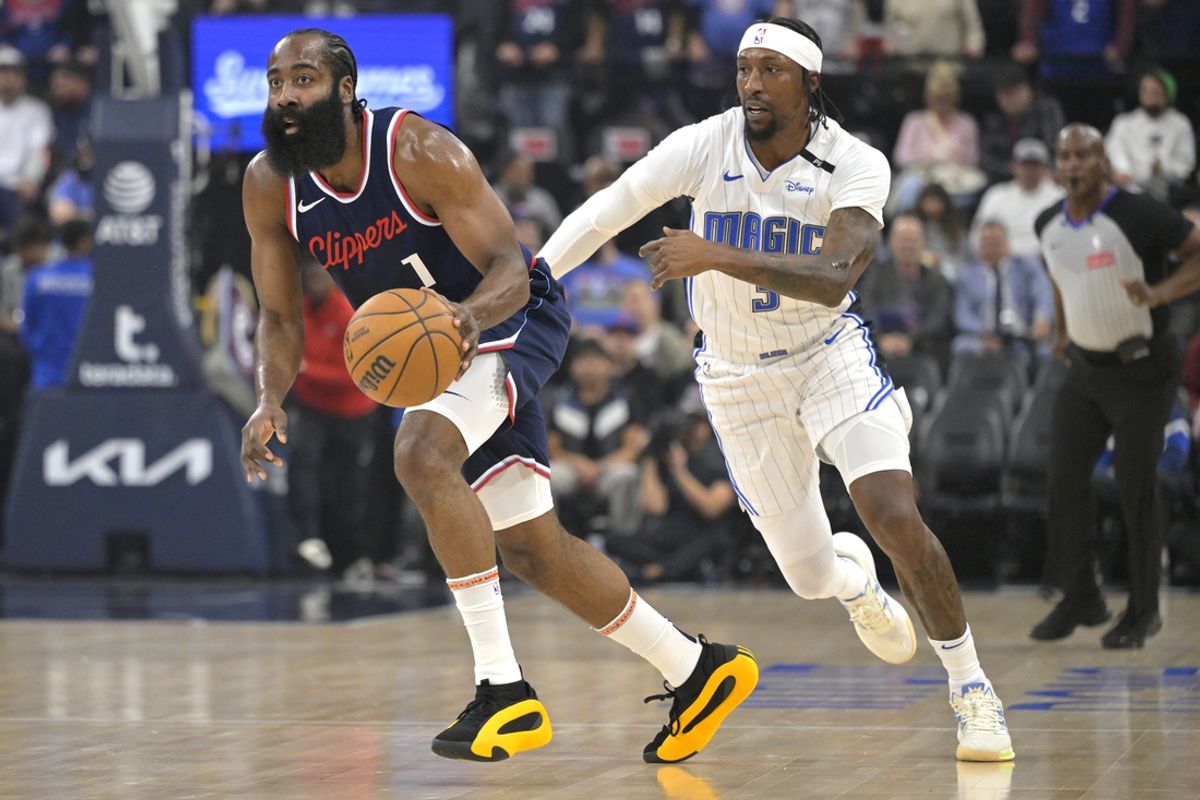 Nov 20, 2024; Inglewood, California, USA;  Los Angeles Clippers guard James Harden (1) is defended by Orlando Magic guard Kentavious Caldwell-Pope (3) in the first half at Intuit Dome. Mandatory Credit: Jayne Kamin-Oncea-Imagn Images