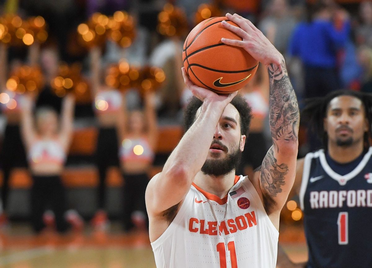 Clemson guard Jaeden Zachery (11) makes a free throw near Radford guard Zion Walker (1) during the second half at Littlejohn Coliseum Thursday, November 21, 2024; Clemson, SC, USA.