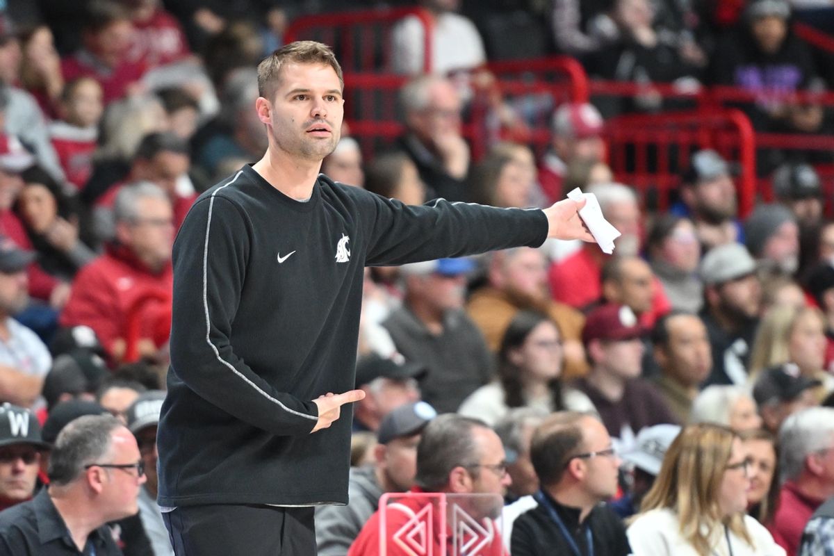 Nov 21, 2024; Spokane, Washington, USA; Washington State Cougars head coach David Riley directs his team against the Eastern Washington Eagles in the first half at Spokane Veterans Memorial Arena. Mandatory Credit: James Snook-Imagn Images