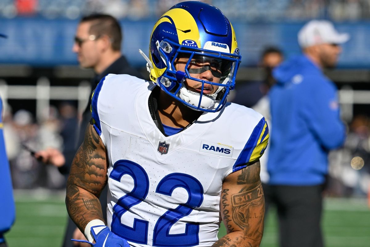 Nov 17, 2024; Foxborough, Massachusetts, USA; Los Angeles Rams running back Blake Corum (22) warms up before a game against the New England Patriots at Gillette Stadium. Mandatory Credit: Eric Canha-Imagn Images