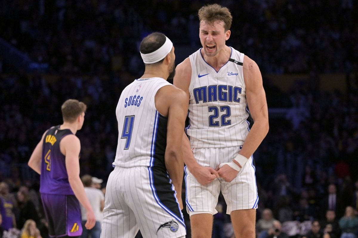 Nov 21, 2024; Los Angeles, California, USA; Orlando Magic forward Franz Wagner (22) celebrates with guard Jalen Suggs (4) after defeating the Los Angeles Lakers with a 3-point basket with 2.5 seconds left in the game at Crypto.com Arena. Mandatory Credit: Jayne Kamin-Oncea-Imagn Images