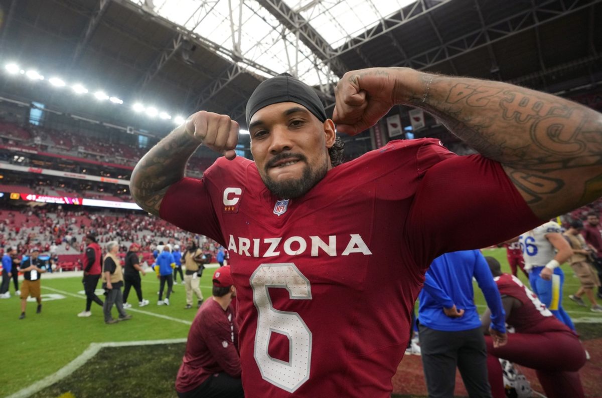 Sep 15, 2024; Glendale, Ariz., U.S.; Arizona Cardinals running back James Conner (6) celebrates as he walks off the field after their 41-10 win over the Los Angeles Rams at State Farm Stadium.