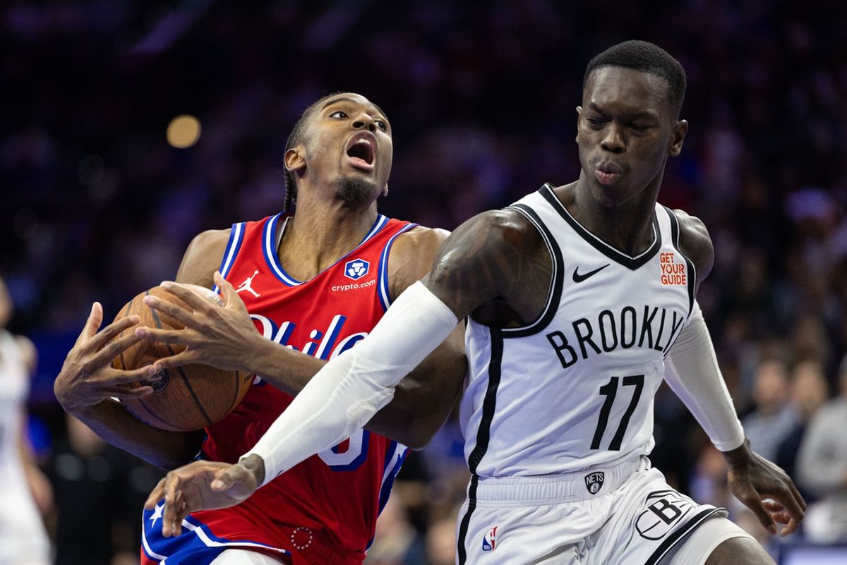 Nov 22, 2024; Philadelphia, Pennsylvania, USA; Philadelphia 76ers guard Tyrese Maxey (0) drives against Brooklyn Nets guard Dennis Schroder (17) during the fourth quarter at Wells Fargo Center. Mandatory Credit: Bill Streicher-Imagn Images