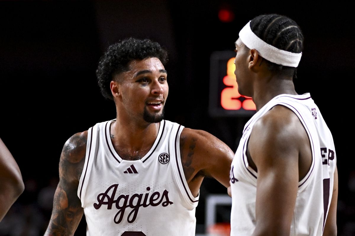 Nov 20, 2024; College Station, Texas, USA; Texas A&M Aggies guard Jace Carter (0) speaks with guard Zhuric Phelps (1) during a time out in the second half against the Southern University Jaguars at Reed Arena. Mandatory Credit: Maria Lysaker-Imagn Images