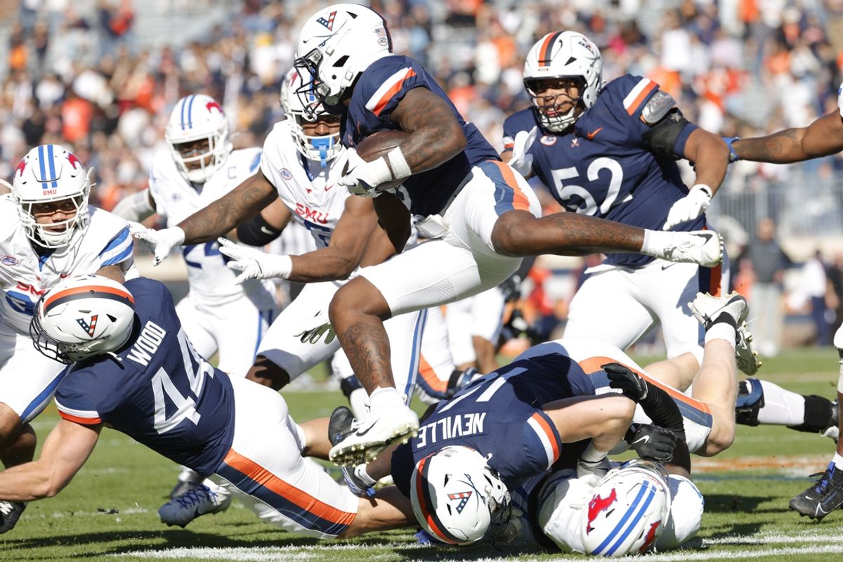 Nov 23, 2024; Charlottesville, Virginia, USA; Virginia Cavaliers running back Kobe Pace (5) carries the ball against the Southern Methodist Mustangs during the first half at Scott Stadium. Mandatory Credit: Amber Searls-Imagn Images