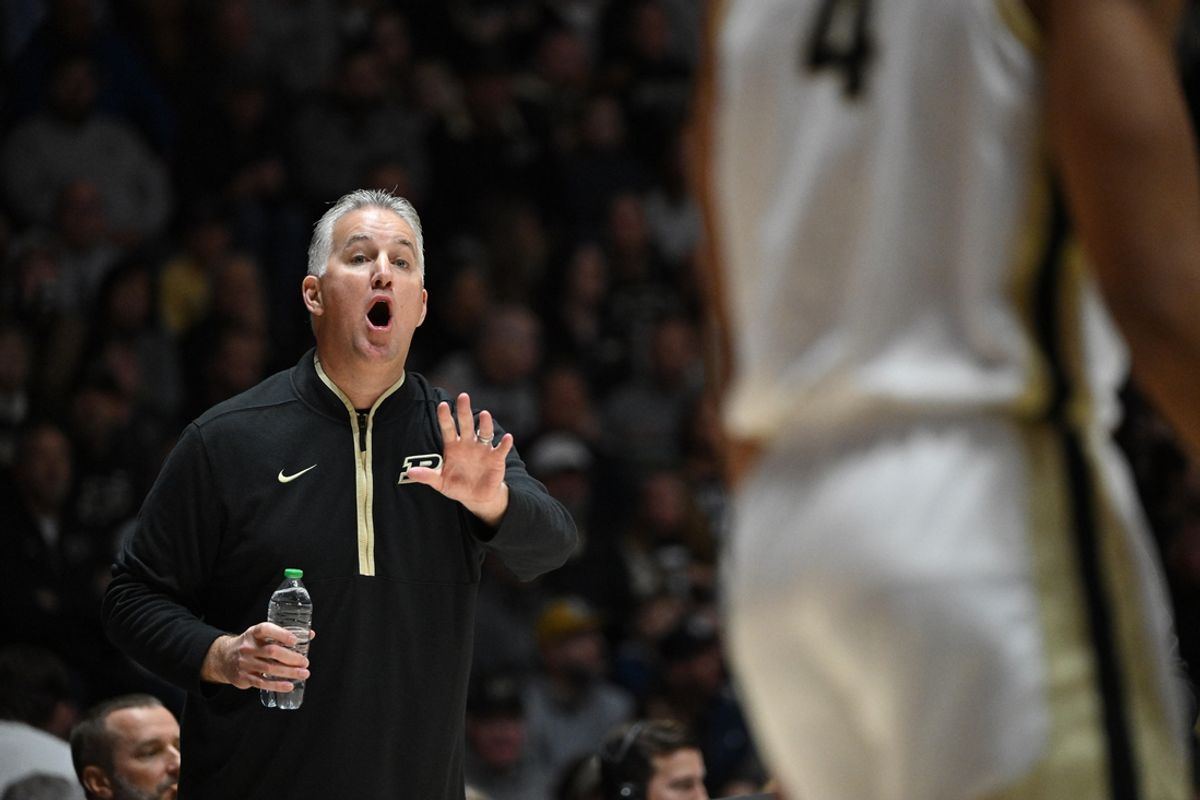 Nov 23, 2024; West Lafayette, Indiana, USA; Purdue Boilermakers head coach Matt Painter yells to forward Trey Kaufman-Renn (4) during the first half against the Marshall Thundering Herd at Mackey Arena. Mandatory Credit: Marc Lebryk-Imagn Images