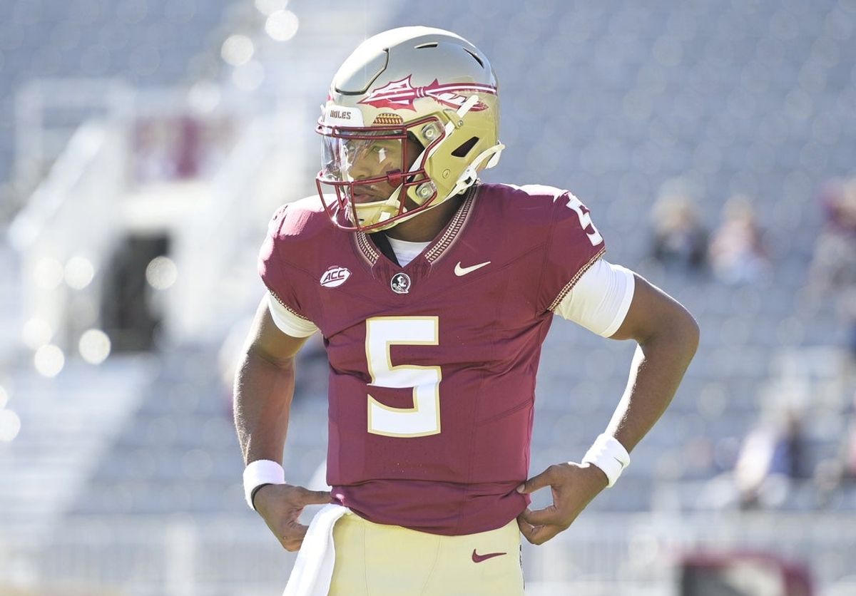 Nov 23, 2024; Tallahassee, Florida, USA; Florida State Seminoles quarterback Trever Jackson (5) warms up before the game against the Charleston Southern Buccaneers at Doak S. Campbell Stadium. Mandatory Credit: Melina Myers-Imagn Images