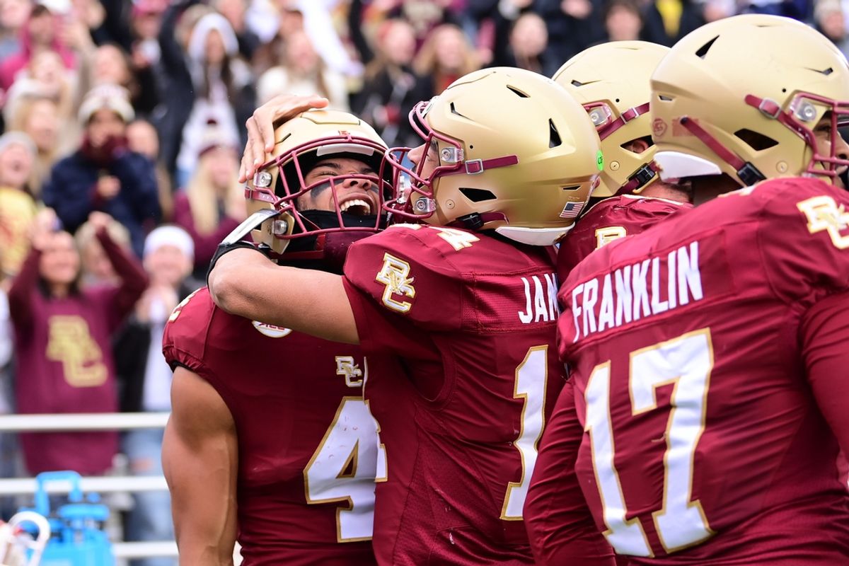 Nov 23, 2024; Chestnut Hill, Massachusetts, USA; Boston College Eagles wide receiver Reed Harris (4) celebrates his touchdown reception with quarterback Grayson James (14) during the first half against the North Carolina Tar Heels at Alumni Stadium. Mandatory Credit: Eric Canha-Imagn Images