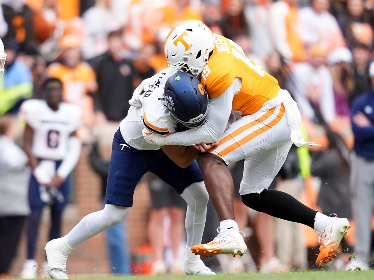 UTEP quarterback Skyler Locklear (9) is tackled by Tennessee defensive lineman Joshua Josephs (19) during an NCAA college football game on Saturday, Nov. 23, 2024, in Knoxville, Tenn.