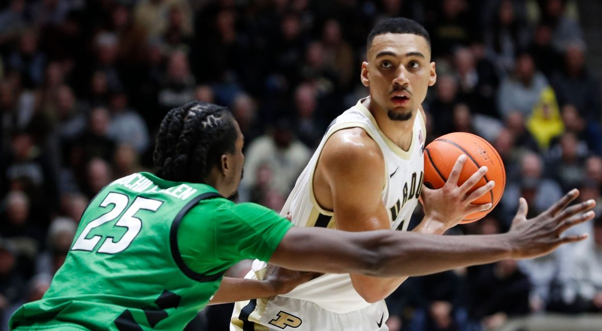 Marshall Thundering Herd forward Obinna Anochili-Killen (25) defends Purdue Boilermakers forward Trey Kaufman-Renn (4) Saturday, Nov. 23, 2024, during the NCAA men’s basketball game at Mackey Arena in West Lafayette, Ind. Purdue Boilermakers won 80-45.
