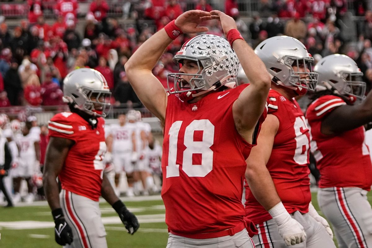 Ohio State Buckeyes quarterback Will Howard (18) celebrates during the second half of the NCAA football game against the Indiana Hoosiers at Ohio Stadium in Columbus on Saturday, Nov. 23, 2024. Ohio State won 38-15.