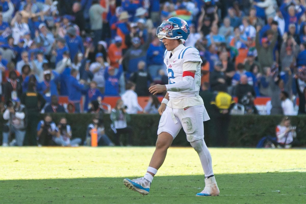 Nov 23, 2024; Gainesville, Florida, USA; Mississippi Rebels quarterback Jaxson Dart (2) walks off the field after throwing an interception against the Florida Gators during the second half at Ben Hill Griffin Stadium. Mandatory Credit: Matt Pendleton-Imagn Images