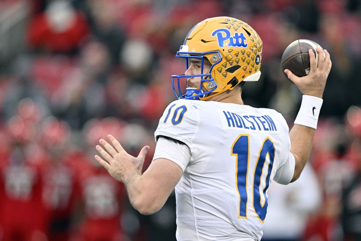 Nov 23, 2024; Louisville, Kentucky, USA;  Pittsburgh Panthers quarterback Eli Holstein (10) throws against the Louisville Cardinals during the first quarter at L&N Federal Credit Union Stadium. Mandatory Credit: Jamie Rhodes-Imagn Images