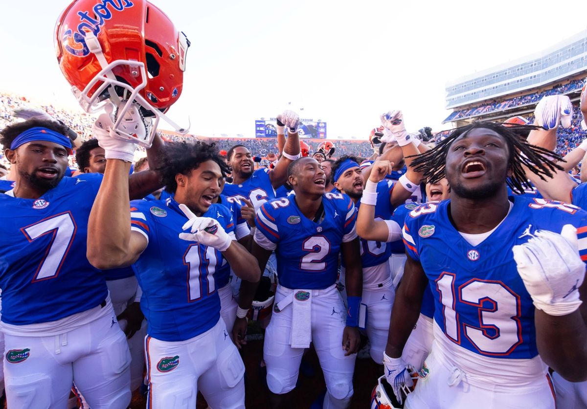 Florida Gators defensive back Trikweze Bridges (7), Florida Gators wide receiver Aidan Mizell (11), Florida Gators quarterback DJ Lagway (2) and Florida Gators running back Jadan Baugh (13) celebrateat Ben Hill Griffin Stadium in Gainesville, FL on Saturday, November 23, 2024. The Gators defeated the Rebels 24-17 [Doug Engle/Gainesville Sun]