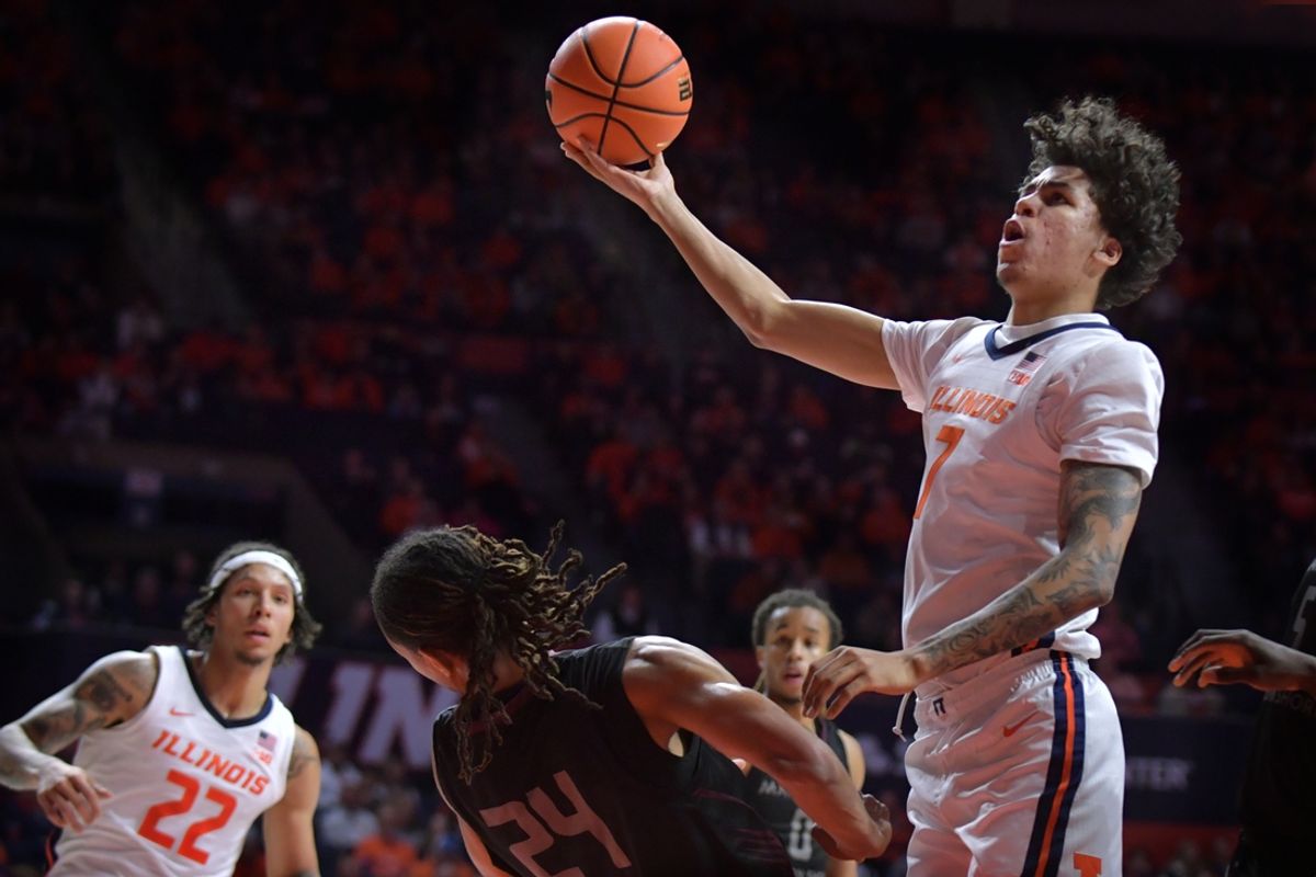 Nov 23, 2024; Champaign, Illinois, USA;  Illinois Fighting Illini forward Will Riley (7) shoots the ball over Maryland-Eastern Shore Hawks forward Jalen Ware (24) during the first half at State Farm Center. Mandatory Credit: Ron Johnson-Imagn Images