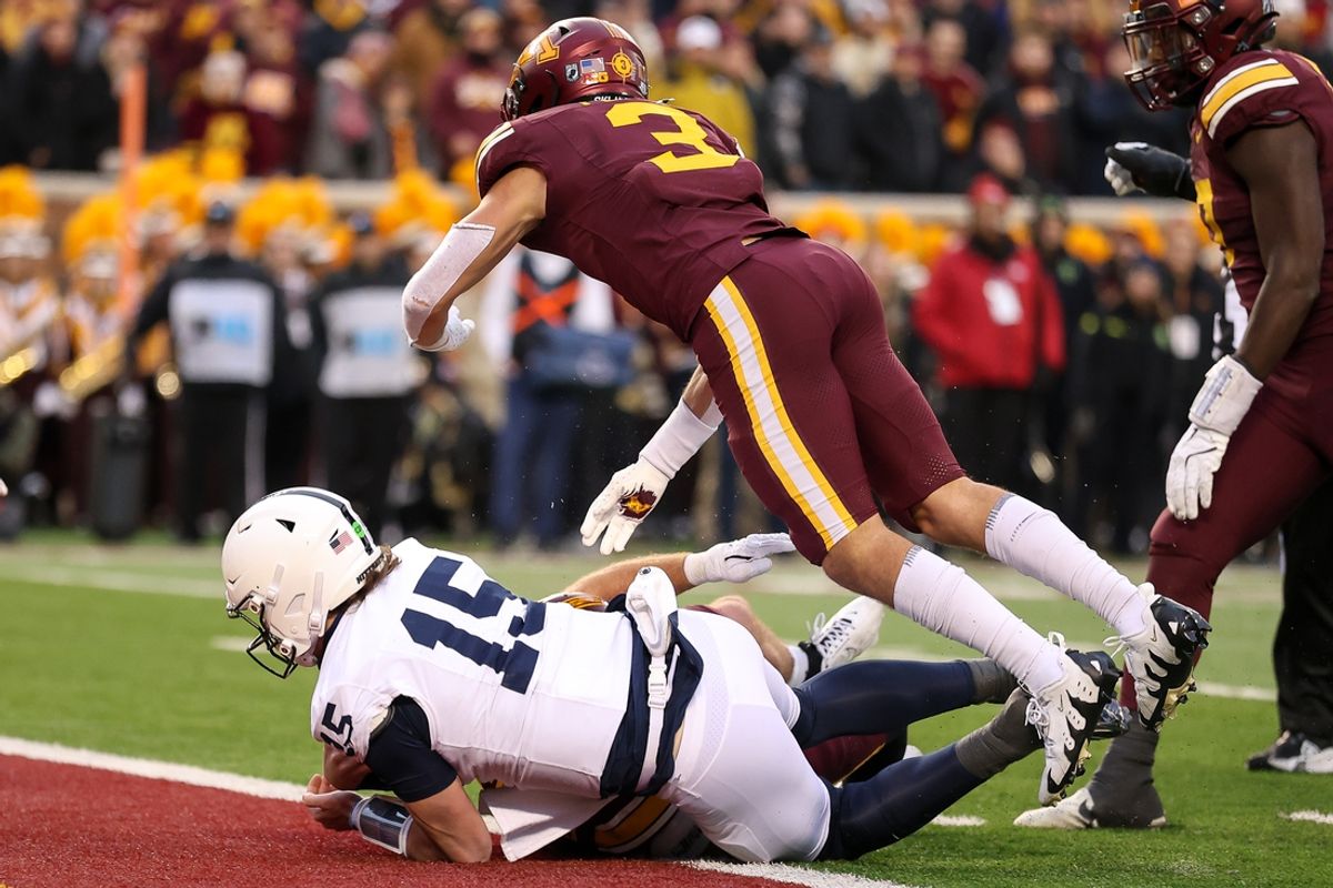 Nov 23, 2024; Minneapolis, Minnesota, USA; Penn State Nittany Lions quarterback Drew Allar (15) runs for a touchdown against the Minnesota Golden Gophers during the second quarter at Huntington Bank Stadium. Mandatory Credit: Matt Krohn-Imagn Images