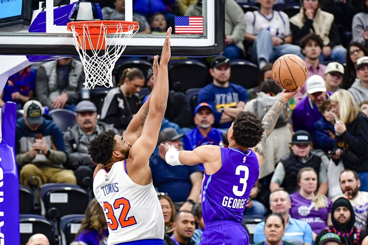 Nov 23, 2024; Salt Lake City, Utah, USA; Utah Jazz guard Keyonte George (3) shoots the ball against New York Knicks center/forward Karl-Anthony Towns (32) during the first half at the Delta Center. Mandatory Credit: Christopher Creveling-Imagn Images