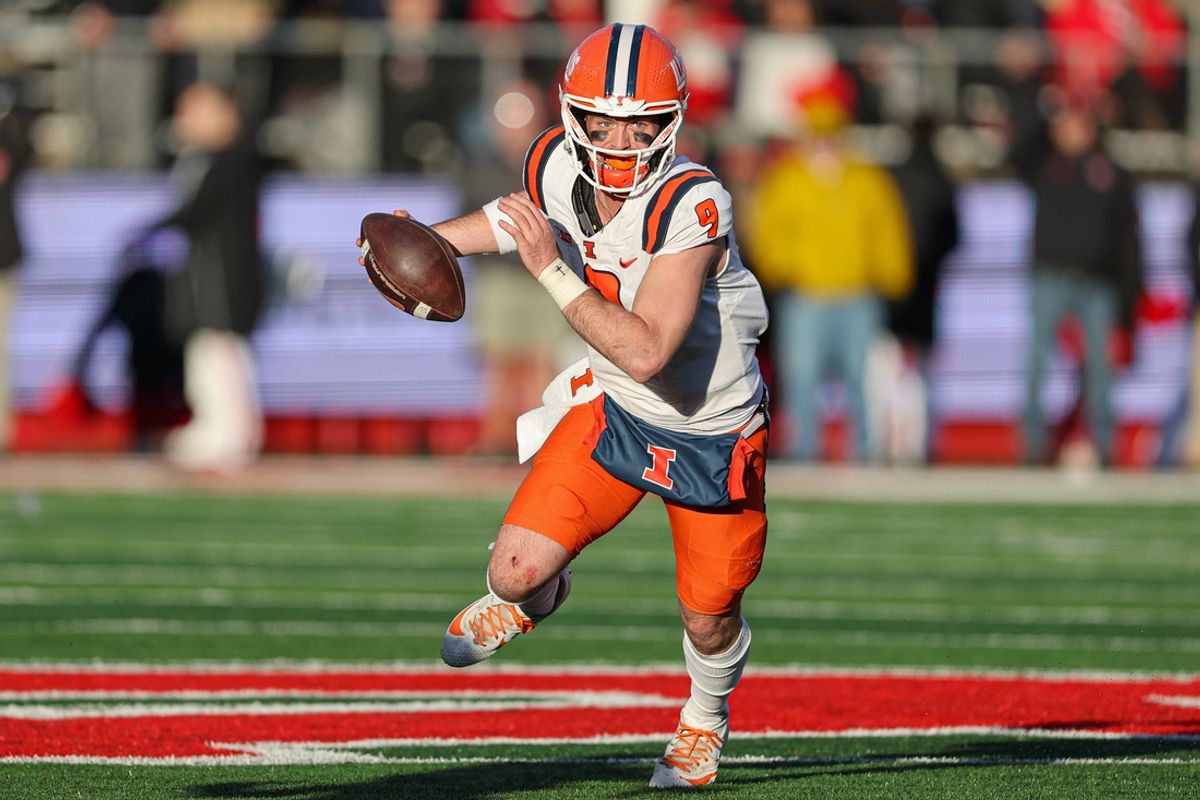 Nov 23, 2024; Piscataway, New Jersey, USA; Illinois Fighting Illini quarterback Luke Altmyer (9) scrambles during the second half against the Rutgers Scarlet Knights at SHI Stadium. Mandatory Credit: Vincent Carchietta-Imagn Images