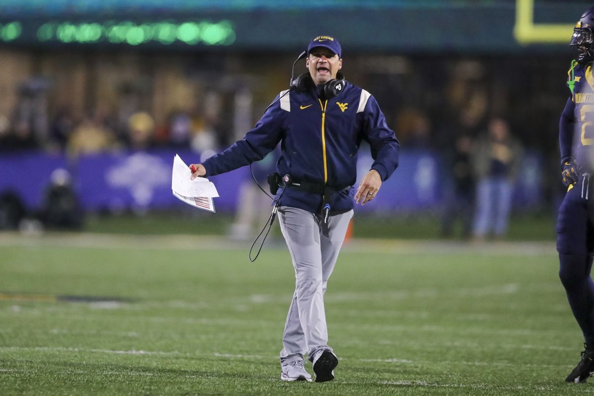 Nov 23, 2024; Morgantown, West Virginia, USA; West Virginia Mountaineers head coach Neal Brown argues a call during the fourth quarter against the UCF Knights at Mountaineer Field at Milan Puskar Stadium. Mandatory Credit: Ben Queen-Imagn Images
