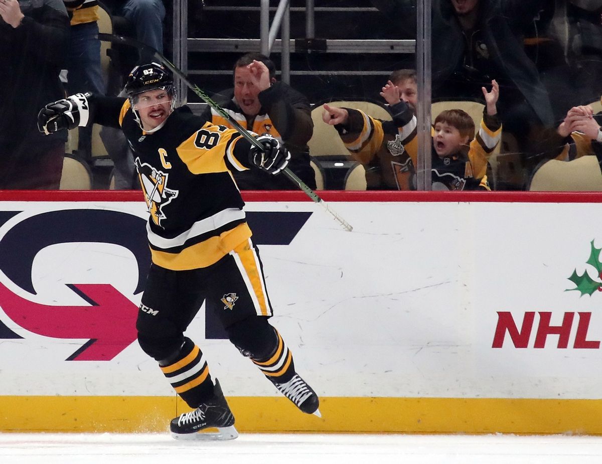 Nov 23, 2024; Pittsburgh, Pennsylvania, USA;  Pittsburgh Penguins center Sidney Crosby (87) reacts after scoring his 600th career NHL goal against the Utah Hockey Club during the second period at PPG Paints Arena. Mandatory Credit: Charles LeClaire-Imagn Images