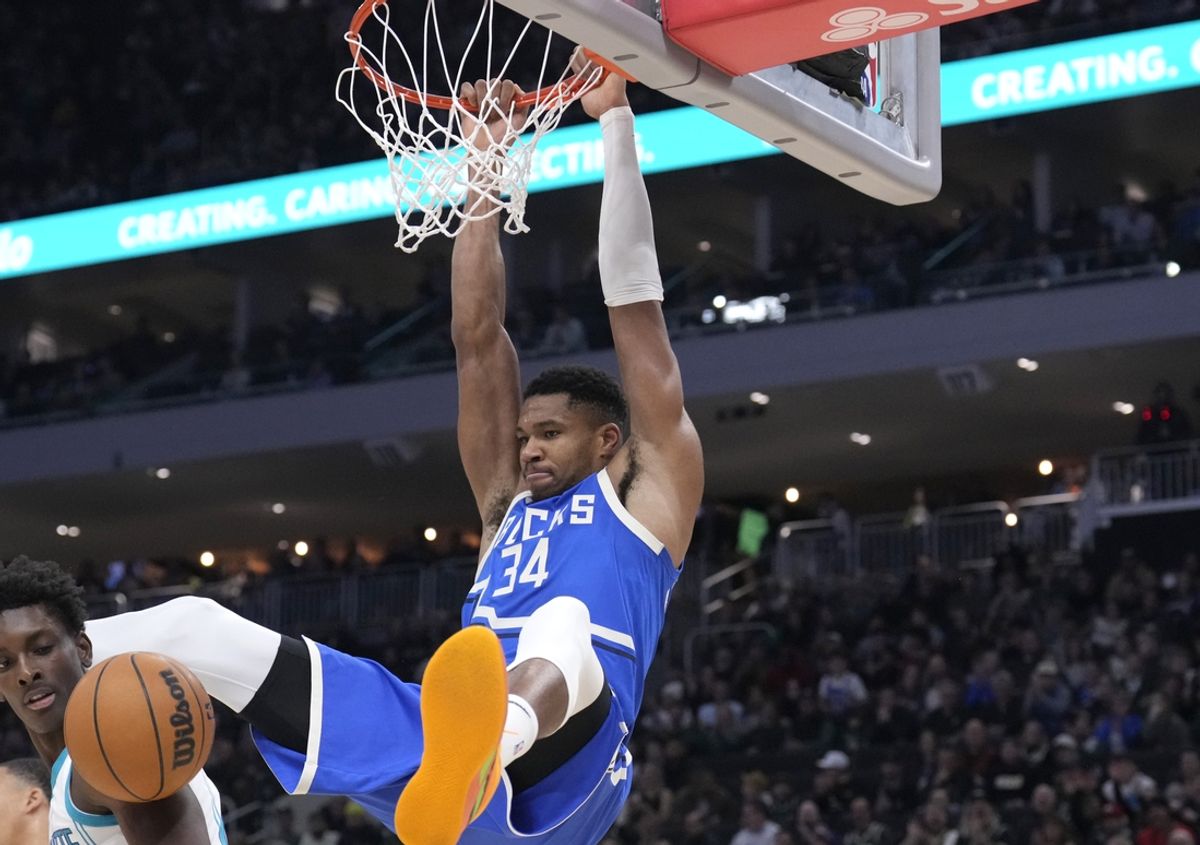 Nov 23, 2024; Milwaukee, Wisconsin, USA; Milwaukee Bucks forward Giannis Antetokounmpo (34) dunks the ball against Charlotte Hornets in the first half at Fiserv Forum. Mandatory Credit: Michael McLoone-Imagn Images