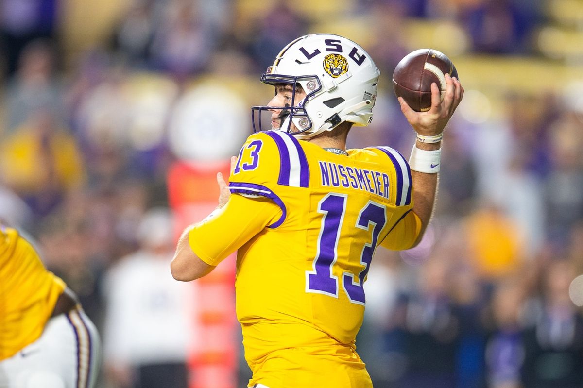 Tigers Quarterback Garrett Nussmeier 13 throws a pass as the LSU Tigers take on the Vanderbilt Commodores. Nov 23, 2024; Baton Rouge, Louisiana, USA; at Tiger Stadium.