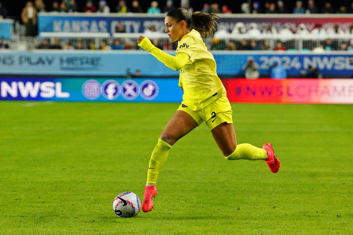 Nov 23, 2024; Kansas City, Missouri, USA; Washington Spirit forward Trinity Rodman (2) controls the ball against the Orlando Pride during the second half in the 2024 NWSL Championship match at CPKC Stadium. Mandatory Credit: Denny Medley-Imagn Images
