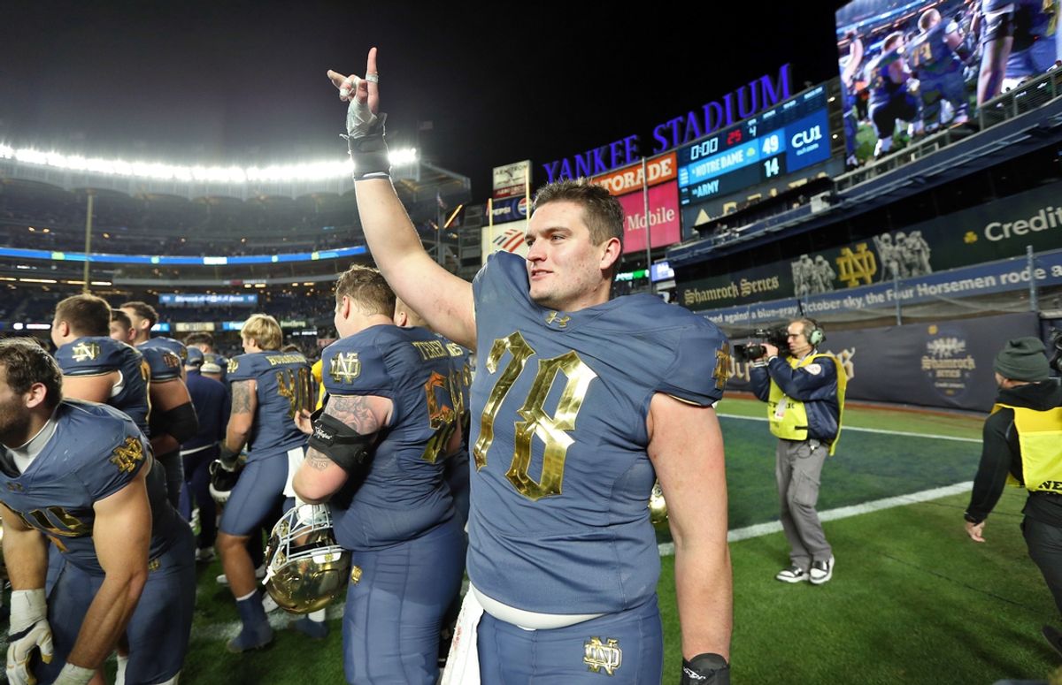 Nov 23, 2024; New York, New York, USA; Notre Dame Fighting Irish offensive lineman Pat Coogan (78) celebrates after a win against the Army Black Knights at Yankee Stadium. Mandatory Credit: Danny Wild-Imagn Images