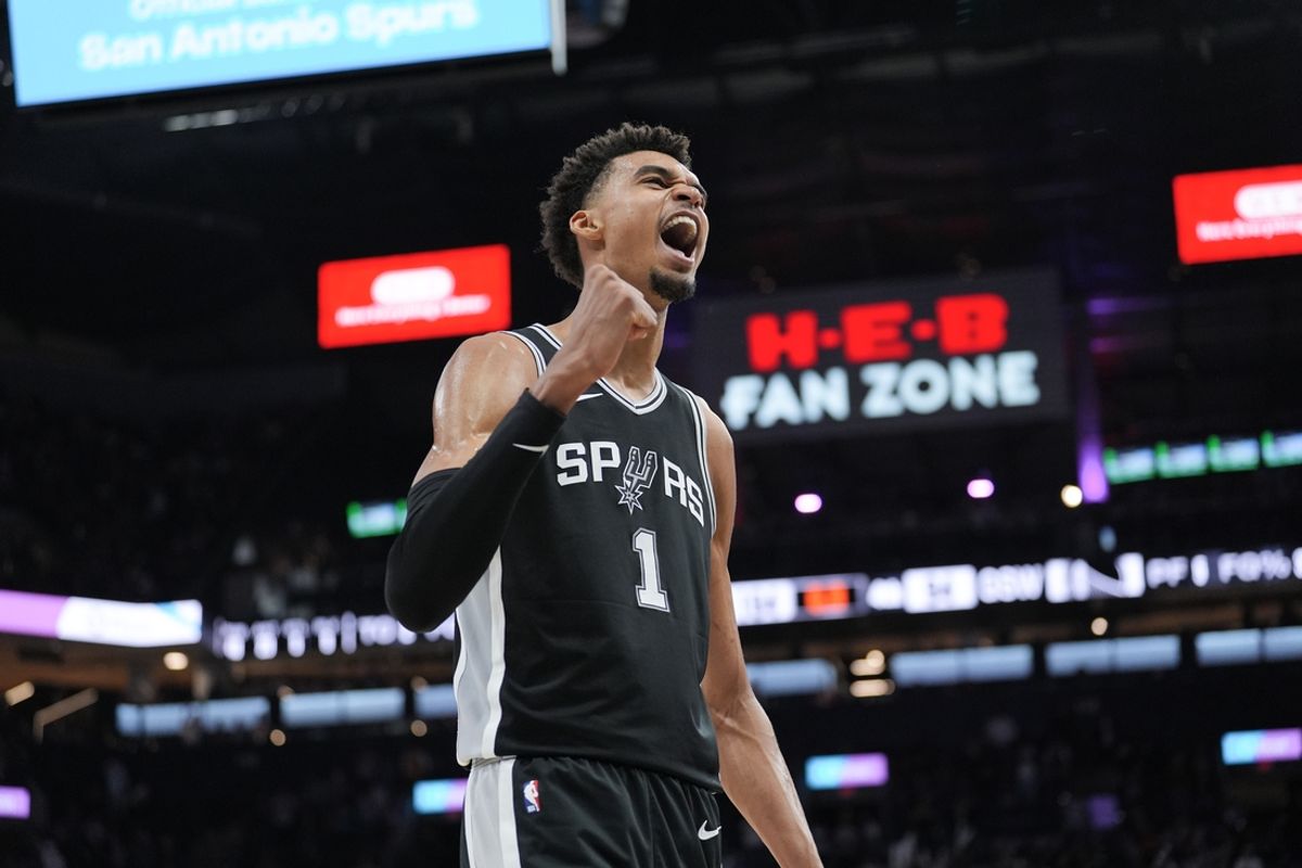 Nov 23, 2024; San Antonio, Texas, USA;  San Antonio Spurs center Victor Wembanyama (1) celebrates in the second half against the Golden State Warriors at Frost Bank Center. Mandatory Credit: Daniel Dunn-Imagn Images