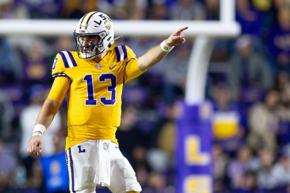Nov 23, 2024; Baton Rouge, Louisiana, USA;  LSU Tigers quarterback Garrett Nussmeier (13) signals a first down against the Vanderbilt Commodores during the second half at Tiger Stadium. Mandatory Credit: Stephen Lew-Imagn Images