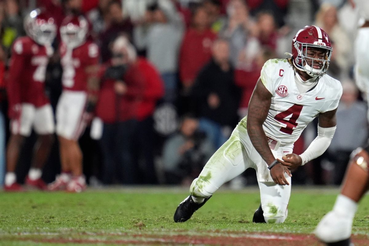 Alabama Crimson Tide quarterback Jalen Milroe (4) gets up after throwing an interception during a college football game between the University of Oklahoma Sooners (OU) and the Alabama Crimson Tide at Gaylord Family - Oklahoma Memorial Stadium in Norman, Okla., Saturday, Nov. 23, 2024. Oklahoma won 24-3.