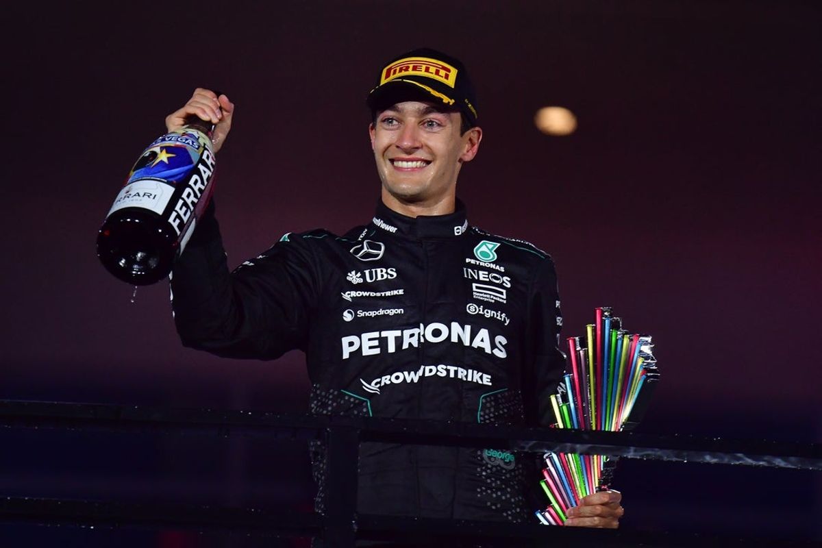 Nov 23, 2024; Las Vegas, Nevada, USA; Mercedes AMG Petronas driver George Russell (63) celebrates his race victory of the Las Vegas Grand Prix at Las Vegas Circuit. Mandatory Credit: Gary A. Vasquez-Imagn Images