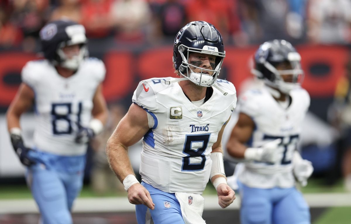 Nov 24, 2024; Houston, Texas, USA; Tennessee Titans quarterback Will Levis (8) runs off the field after throwing a touchdown pass against the Houston Texans in the first quarter at NRG Stadium. Mandatory Credit: Thomas Shea-Imagn Images