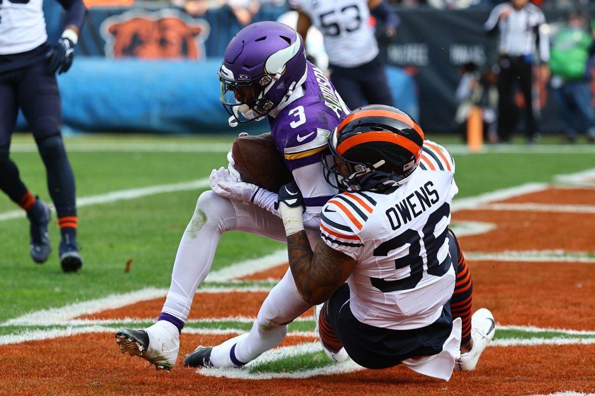 Nov 24, 2024; Chicago, Illinois, USA; Minnesota Vikings wide receiver Jordan Addison (3) catches a touchdown pass against Chicago Bears safety Jonathan Owens (36) during the second quarter at Soldier Field. Mandatory Credit: Mike Dinovo-Imagn Images