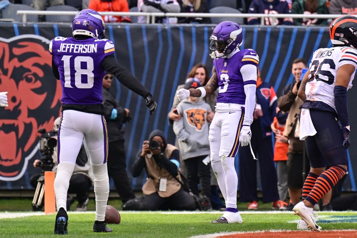 Nov 24, 2024; Chicago, Illinois, USA; Minnesota Vikings wide receiver Jordan Addison (3) celebrates his receiving touchdown with wide receiver Justin Jefferson (18) against the Chicago Bears during the second quarter at Soldier Field. Mandatory Credit: Daniel Bartel-Imagn Images