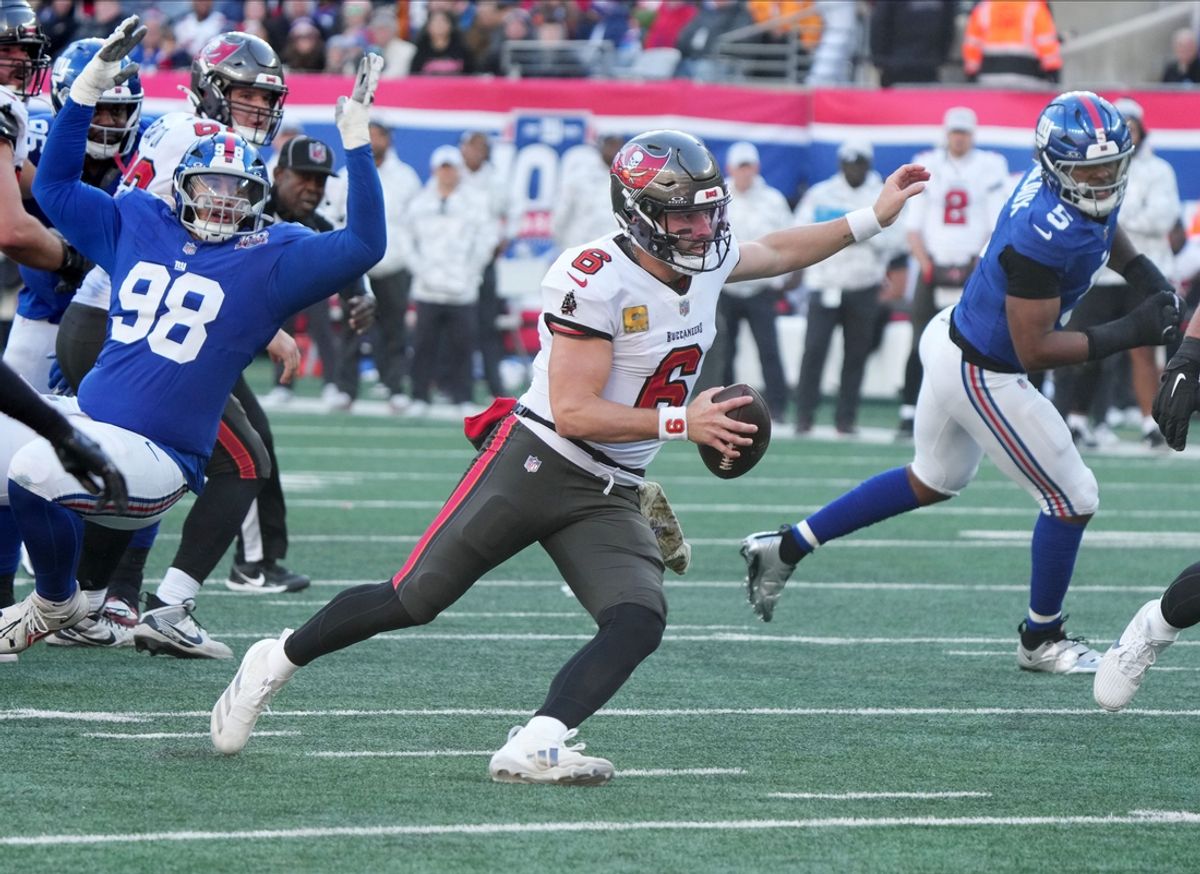 East Rutherford, NJ -- November 24, 2024 -- Baker Mayfield of Tampa Bay runs for a TD late in the first half as the Tampa Bay Buccaneers came to MetLife Stadium to play the New York Giants.