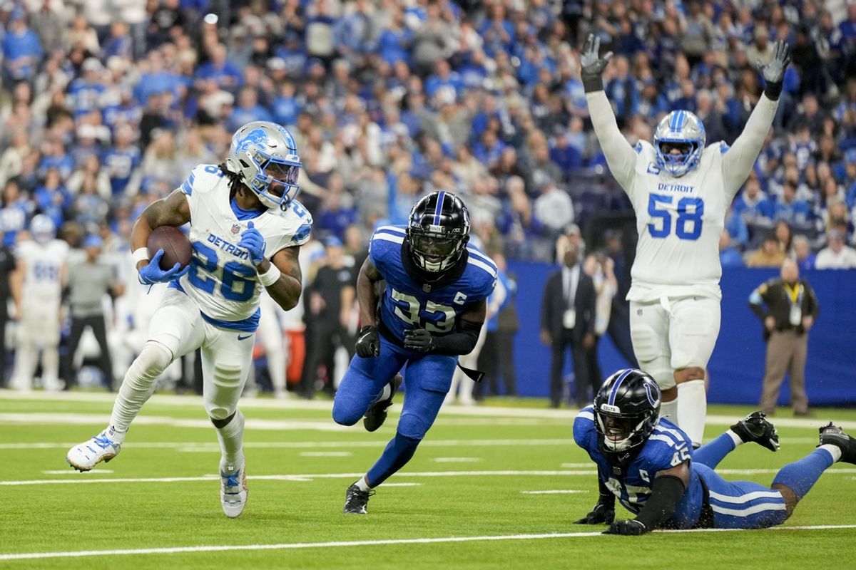 Nov 24, 2024; Indianapolis, Indiana, USA; Detroit Lions running back Jermar Jefferson (28) rushes for a touchdown during a game against the Indianapolis Colts at Lucas Oil Stadium. Mandatory Credit: Grace Hollars/USA TODAY Network via Imagn Images