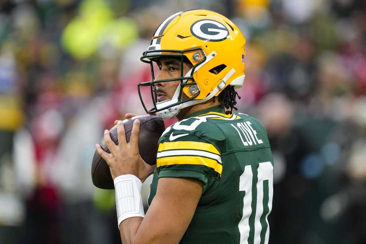 Nov 24, 2024; Green Bay, Wisconsin, USA;  Green Bay Packers quarterback Jordan Love (10) throws a pass during warmups prior to the game against the San Francisco 49ers at Lambeau Field. Mandatory Credit: Jeff Hanisch-Imagn Images