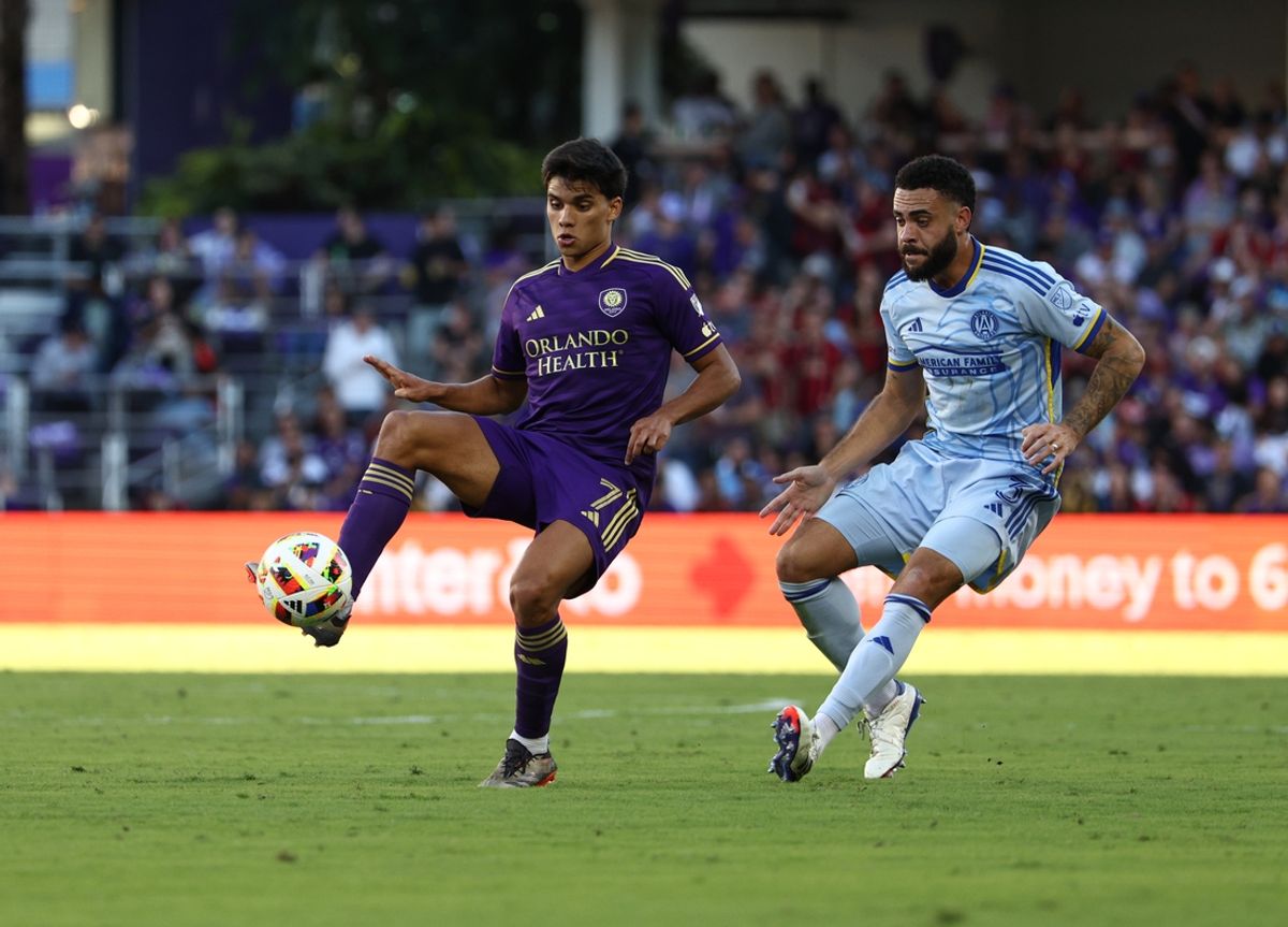 Nov 24, 2024; Orlando, Florida, USA; Orlando City forward Ramiro Enrique (7) and Atlanta United defender Derrick Williams (3) battle for control of the ball during the first half in a 2024 MLS Cup conference semifinal match at Inter&Co Stadium. Mandatory Credit: Nathan Ray Seebeck-Imagn Images
