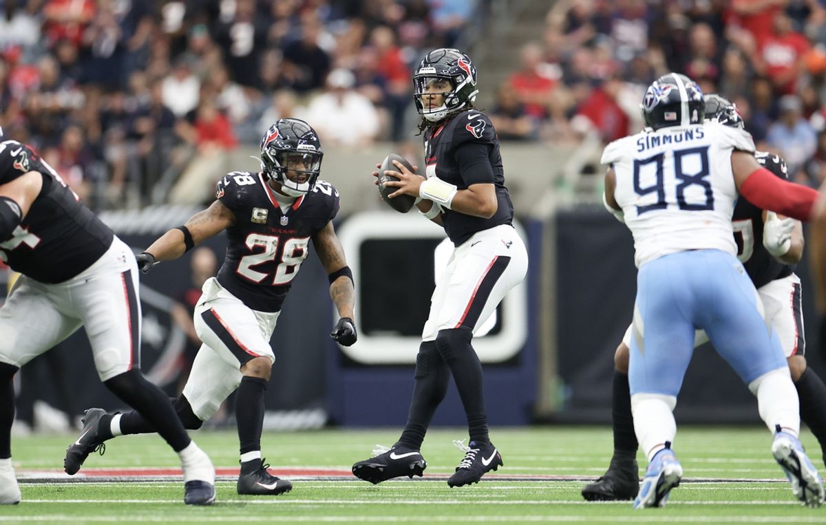 Nov 24, 2024; Houston, Texas, USA; Houston Texans quarterback C.J. Stroud (7) drops back to pass against the Tennessee Titans in the fourth quarter at NRG Stadium. Mandatory Credit: Thomas Shea-Imagn Images