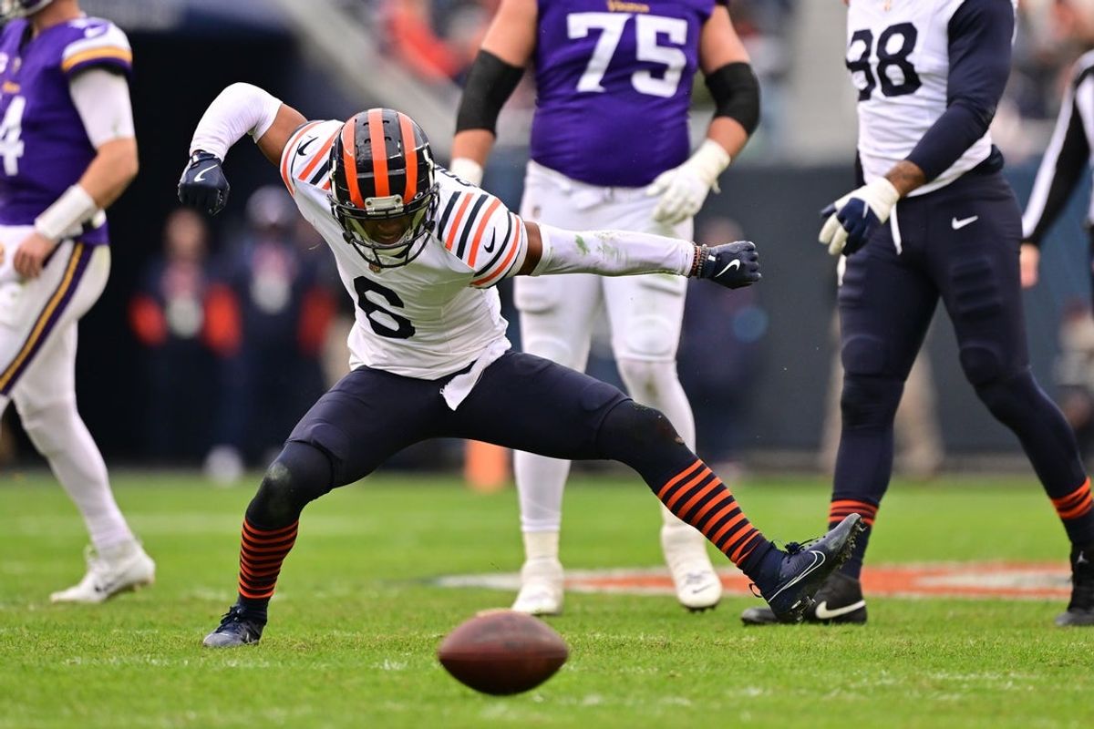 Nov 24, 2024; Chicago, Illinois, USA; Chicago Bears cornerback Kyler Gordon (6) celebrates a defensive stop on 4th down against the Minnesota Vikings during the fourth quarter at Soldier Field. Mandatory Credit: Daniel Bartel-Imagn Images