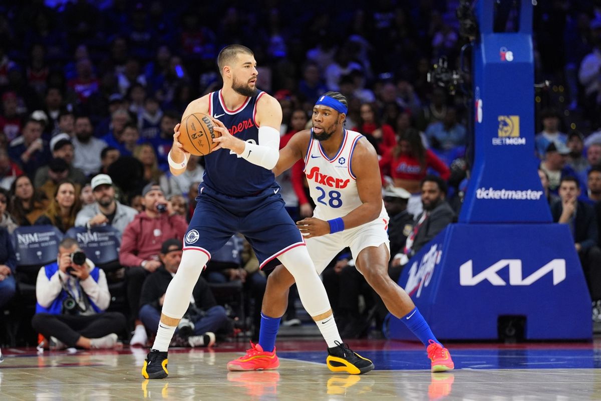 Nov 24, 2024; Philadelphia, Pennsylvania, USA; Los Angeles Clippers center Ivica Zubac (40) controls the ball against Philadelphia 76ers forward Guerschon Yabusele (28) in the first quarter at Wells Fargo Center. Mandatory Credit: Kyle Ross-Imagn Images