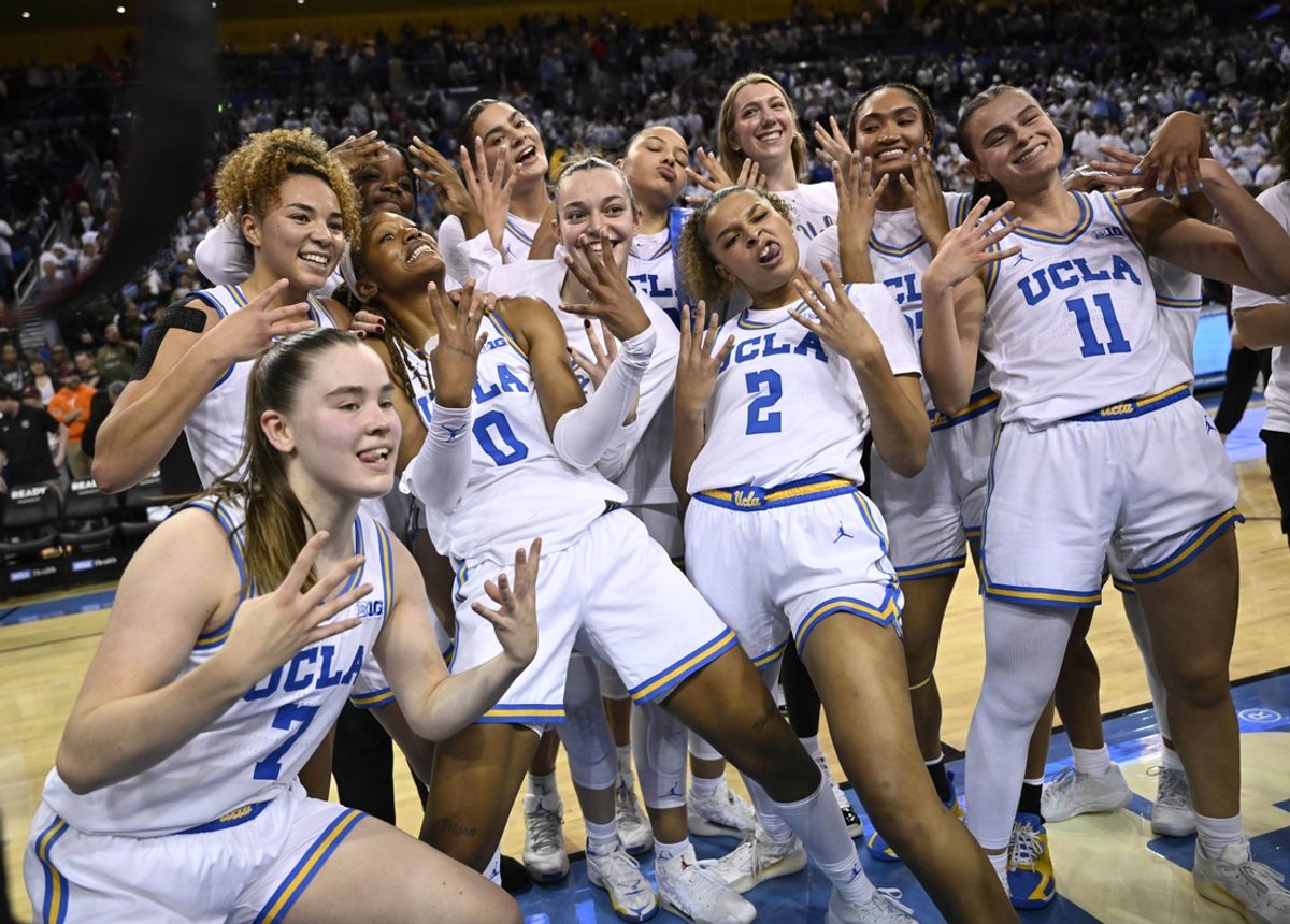 Nov 24, 2024; Los Angeles, California, USA; UCLA Bruins pose for the video cameras after defeating #1 ranked South Carolina Gamecocks  at Pauley Pavilion presented by Wescom. Mandatory Credit: Robert Hanashiro-Imagn Images