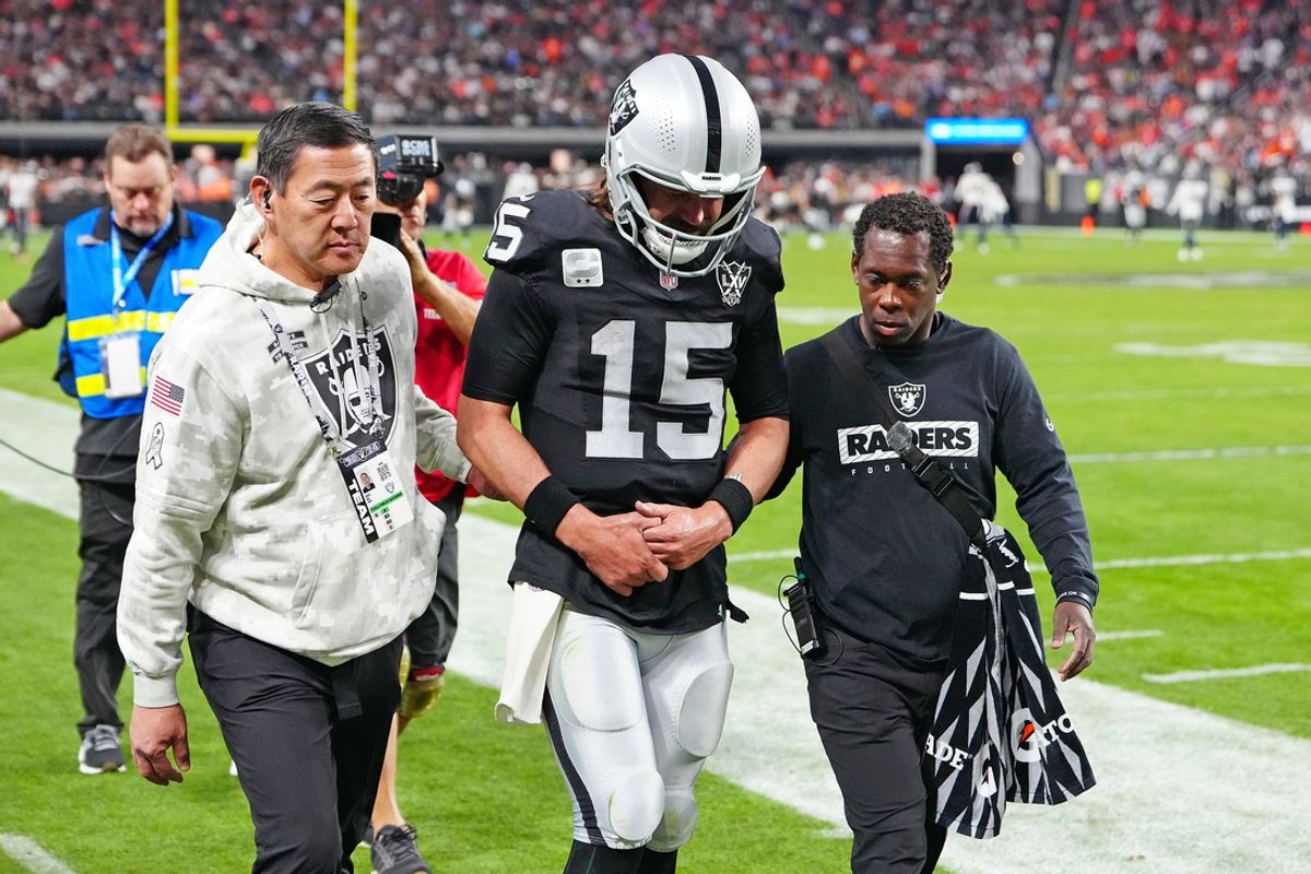Nov 24, 2024; Paradise, Nevada, USA; Las Vegas Raiders quarterback Gardner Minshew (15) heads for the locker room after sustaining an apparent injury during a play against the Denver Broncos during the fourth quarter at Allegiant Stadium. Mandatory Credit: Stephen R. Sylvanie-Imagn Images