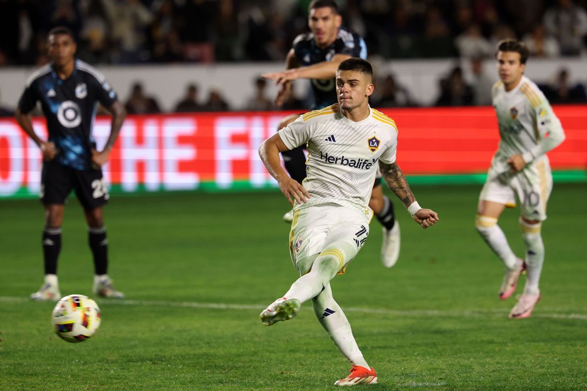 Nov 24, 2024; Carson, California, USA; LA Galaxy forward Gabriel Pec (11) shoots the ball for a goal on a penalty shot against Minnesota United during the second half in a 2024 MLS Cup conference semifinal match at Dignity Health Sports Park. Mandatory Credit: Kiyoshi Mio-Imagn Images