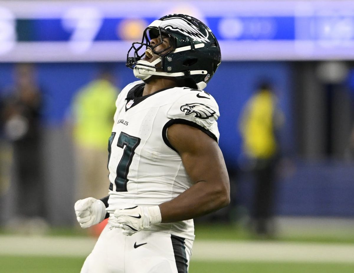 Nov 24, 2024; Inglewood, California, USA;  Philadelphia Eagles linebacker Nakobe Dean (17) reacts after sacking Los Angeles Rams quarterback Matthew Stafford (not pictured) during the first half at SoFi Stadium. Mandatory Credit: Alex Gallardo-Imagn Images