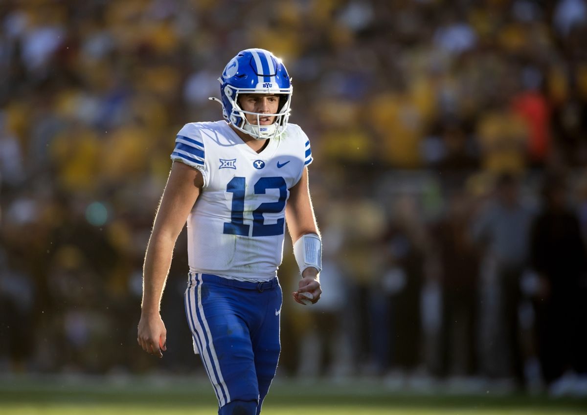 Nov 23, 2024; Tempe, Arizona, USA; Brigham Young Cougars quarterback Jake Retzlaff (12) against the Arizona State Sun Devils at Mountain America Stadium. Mandatory Credit: Mark J. Rebilas-Imagn Images